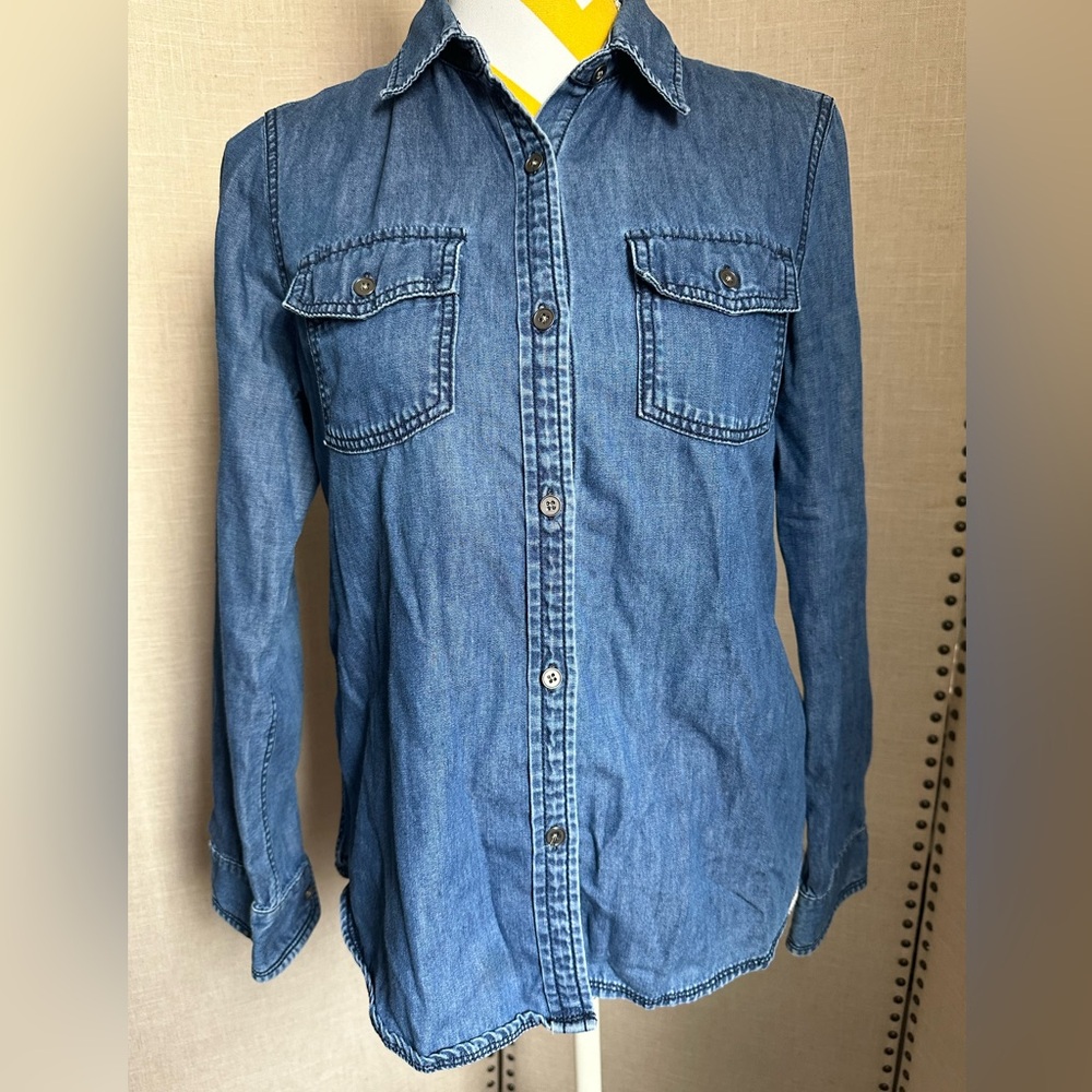 Women’s lightweight longsleeve denim button-down shirt from Banana Republic.